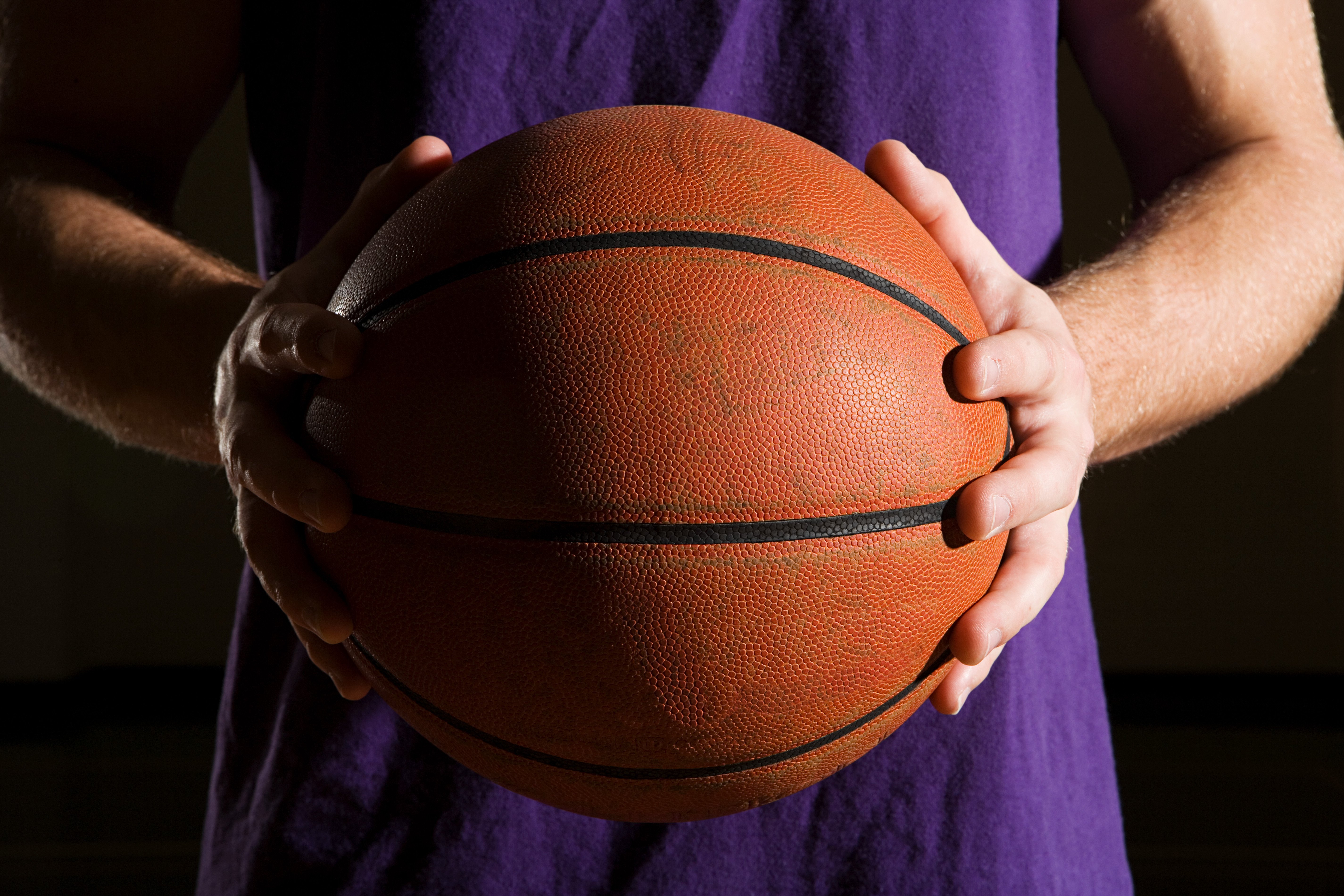 Man holding basketball
